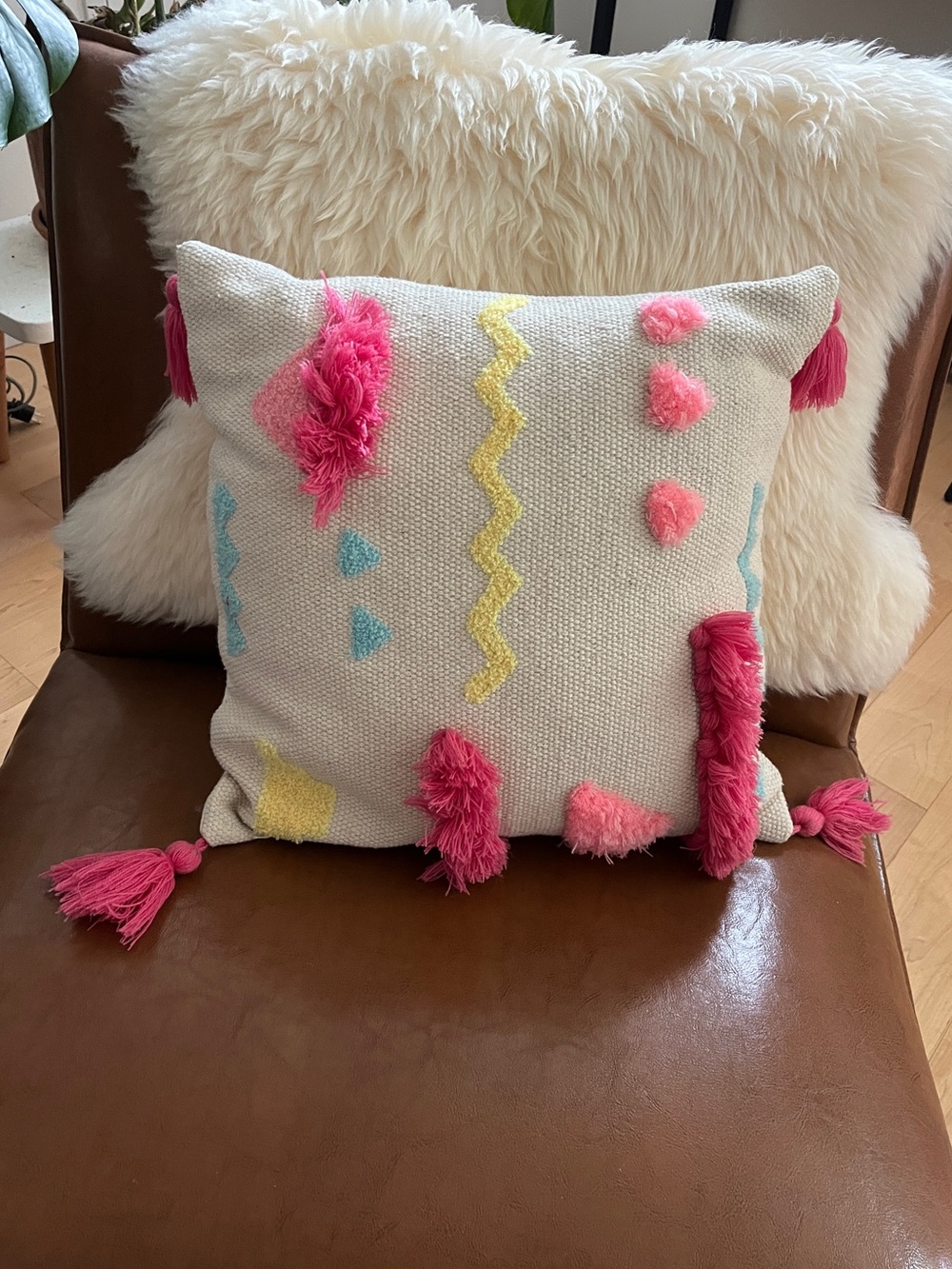 Textured Tassel Throw Pillow with Pink & Yellow Accents